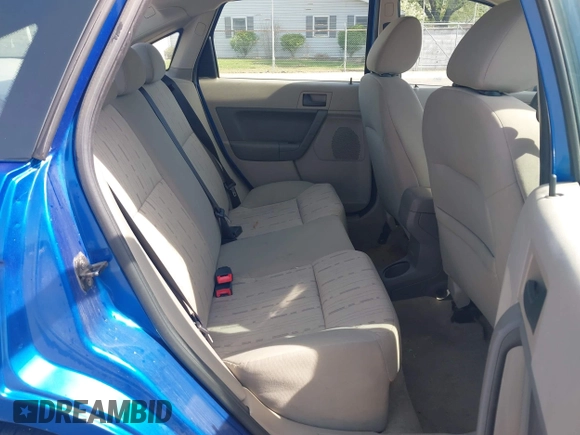 2010 Ford Focus SE with VIN 1FAHP3FNXAW159048, listed as a IAAI auction lot 42103062 with 142,810 mi miles. Bid and sale history available at carsss.com. Image 8.