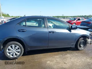 2016 Toyota Corolla L with VIN 5YFBURHE7GP457115, listed as a IAAI auction lot 41998924 with 117,445 mi miles and . Bid and sale history available at DreamBid. Image 13.