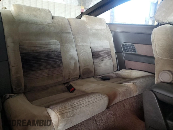 1989 Ford Probe z VIN 1ZVBT21C8K5178908, wystawiony jako Copart lot #87082684 z przebiegiem 84 344 mil mil oraz Tytuł czysty. Historia ofert i sprzedaży dostępna na DreamBid. Obrazek 10.