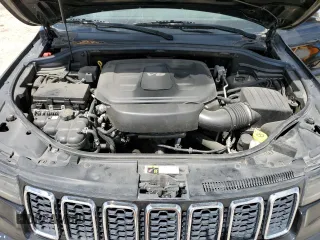 2018 Jeep Grand Cherokee Limited z VIN 1C4RJFBG8JC331703, wystawiony jako Copart lot #55220385 z przebiegiem 149 035 mil mil oraz Szkoda całkowita • Salvage title. Historia ofert i sprzedaży dostępna na DreamBid. Obrazek 12.