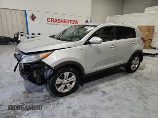 2013 Kia Sportage LX with VIN KNDPBCA24D7443677, listed as a Copart auction lot 58478685 with 293,092 mi miles and Salvage title. Bid and sale history available at DreamBid. Image 1.