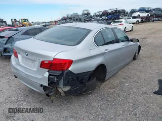 2015 BMW 5 Series 535i xDrive with VIN WBA5B3C54FD544802, listed as a IAAI auction lot 41283822 with 93,828 mi miles. Bid and sale history available at carsss.com. Image 4.