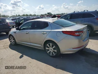 2012 Kia Optima SX z VIN 5XXGR4A64CG023279, wystawiony jako Copart lot #61482775 z przebiegiem 213 282 mil mil oraz Czysty tytuł • Clean title. Historia ofert i sprzedaży dostępna na DreamBid. Obrazek 2.