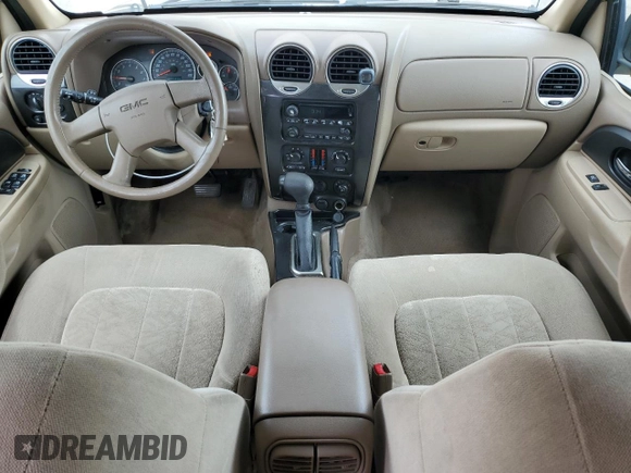 2004 GMC Envoy SLT with VIN 1GKDT13S142425057, listed as a Copart auction lot 69037524 with 231,483 mi miles and Salvage Title. Bid and sale history available at carsss.com. Image 8.