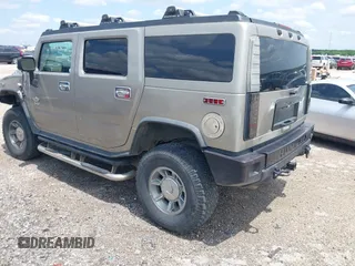 2003 Hummer H2 with VIN 5GRGN23U23H148326, listed as a IAAI auction lot 42068326 with 149,396 mi miles. Bid and sale history available at carsss.com. Image 3.
