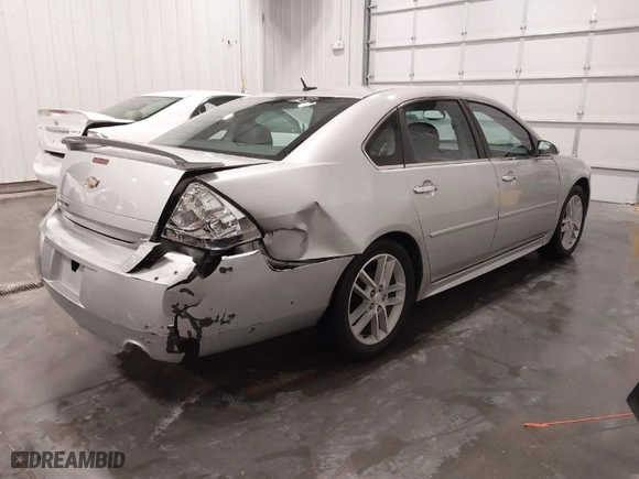 2013 Chevrolet Impala LTZ with VIN 2G1WC5E37D1241848, listed as a IAAI auction lot 41863719 with 167,482 mi miles. Bid and sale history available at carsss.com. Image 4.