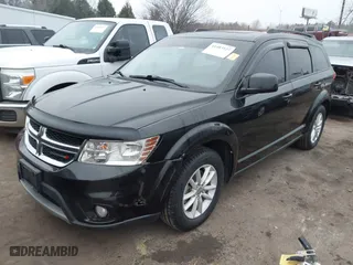 2013 Dodge Journey SXT with VIN 3C4PDCBB1DT565028, listed as a IAAI auction lot 41483127 with 129,997 mi miles. Bid and sale history available at carsss.com. Image 17.