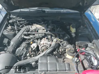 2000 Ford Mustang GT z VIN 1FAFP42X1YF145778, wystawiony jako IAAI lot #39725645 z przebiegiem 146 260 mil mil oraz . Historia ofert i sprzedaży dostępna na DreamBid. Obrazek 12.