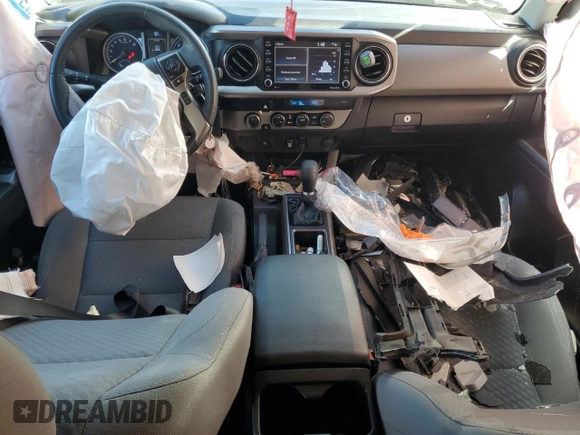 2021 Toyota Tacoma SR5 with VIN 3TMDZ5BN0MM103256, listed as a Copart auction lot 50101675 with 49,673 mi miles and Salvage title. Bid and sale history available at DreamBid. Image 8.
