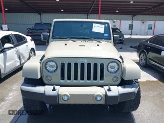 2018 Jeep Wrangler Sahara z VIN 1C4AJWBGXJL811092, wystawiony jako IAAI lot #42305620 z przebiegiem 41 021 mil mil oraz . Historia ofert i sprzedaży dostępna na DreamBid. Obrazek 12.