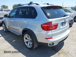 2012 BMW X5 35d with VIN 5UXZW0C58CL671141, listed as a IAAI auction lot 42644381 with 127,464 mi miles and . Bid and sale history available at DreamBid. Image 3.