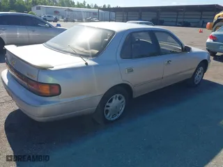1994 Toyota Camry XLE with VIN 4T1GK13E1RU045195, listed as a IAAI auction lot 41715494 with 177,236 mi miles. Bid and sale history available at carsss.com. Image 4.