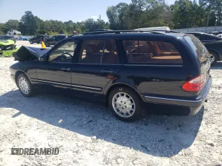 2001 Mercedes-Benz E-Class AWD with VIN WDBJH82J91X057063, listed as a Copart auction lot 70235274 with 174,846 mi miles and Salvage Title. Bid and sale history available at carsss.com. Image 2.