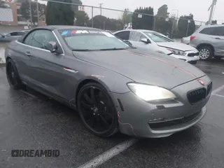2012 BMW 6 Series 650i with VIN WBALZ3C5XCDL70748, listed as a IAAI auction lot 41502640 with 102,519 mi miles. Bid and sale history available at carsss.com. Image 1.