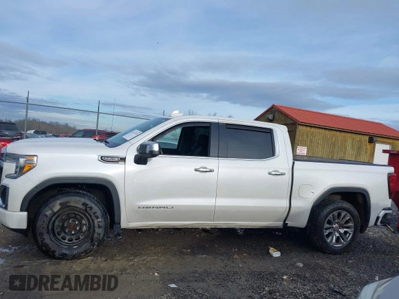 2020 GMC Sierra 1500 Denali with VIN 1GTU9FED8LZ370425, listed as a IAAI auction lot 41172378 with 57,291 mi miles and . Bid and sale history available at DreamBid. Image 14.