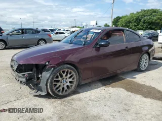 2010 BMW 3 Series 328i with VIN WBAWV1C5XAP124338, listed as a Copart auction lot 58415205 with 176,697 mi miles and Salvage title. Bid and sale history available at DreamBid. Image 1.