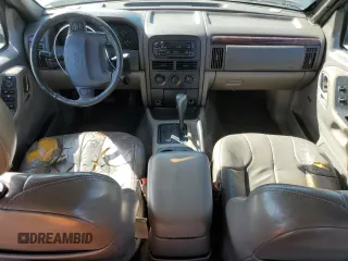 2000 Jeep Grand Cherokee Laredo with VIN 1J4G248S2YC377133, listed as a Copart auction lot 57916785 with 217,525 mi miles and Salvage title. Bid and sale history available at DreamBid. Image 8.