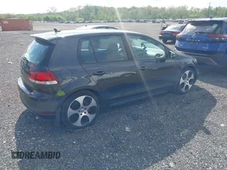 2011 Volkswagen GTI w/Sunroof & Navi PZEV z VIN WVWGD7AJ7BW070534, wystawiony jako IAAI lot #42159521 z przebiegiem 138 279 mil mil oraz . Historia ofert i sprzedaży dostępna na DreamBid. Obrazek 4.