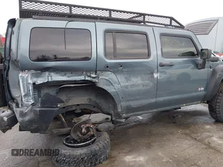 2006 Hummer H3 with VIN 5GTDN136768328477, listed as a IAAI auction lot 41503307 with 186,944 mi miles. Bid and sale history available at carsss.com. Image 6.