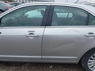 2010 Ford Fusion Hybrid with VIN 3FADP0L30AR121282, listed as a IAAI auction lot 41943397 with 109,559 mi miles. Bid and sale history available at carsss.com. Image 14.
