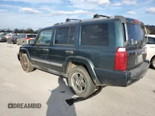2006 Jeep Commander with VIN 1J8HH48N46C133122, listed as a Copart auction lot 80821094 with 216,412 mi miles and Salvage Title. Bid and sale history available at carsss.com. Image 2.