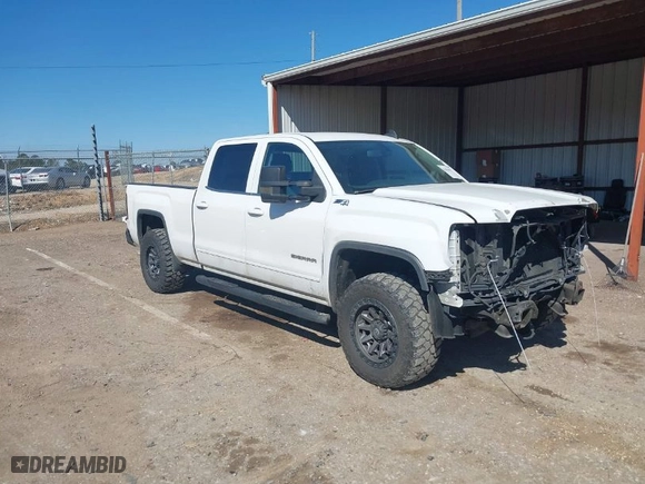 2015 GMC Sierra 1500 SLE with VIN 3GTU2UEC9FG315292, listed as a IAAI auction lot 41641819 with 184,613 mi miles. Bid and sale history available at carsss.com. Image 1.