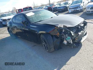 2013 Subaru BRZ Limited z VIN JF1ZCAC16D1613061, wystawiony jako IAAI lot #40945347 z przebiegiem 82 448 mil mil oraz . Historia ofert i sprzedaży dostępna na DreamBid. Obrazek 1.