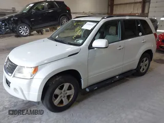 2009 Suzuki Grand Vitara z VIN JS3TD044294100168, wystawiony jako IAAI lot #42489252 z przebiegiem 152 679 mil mil oraz . Historia ofert i sprzedaży dostępna na DreamBid. Obrazek 2.