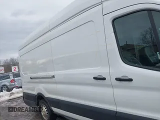 2023 Ford Transit Cargo with VIN 1FTBR3U80PKA40125, listed as a IAAI auction lot 41709473 with 83,626 mi miles and . Bid and sale history available at DreamBid. Image 6.