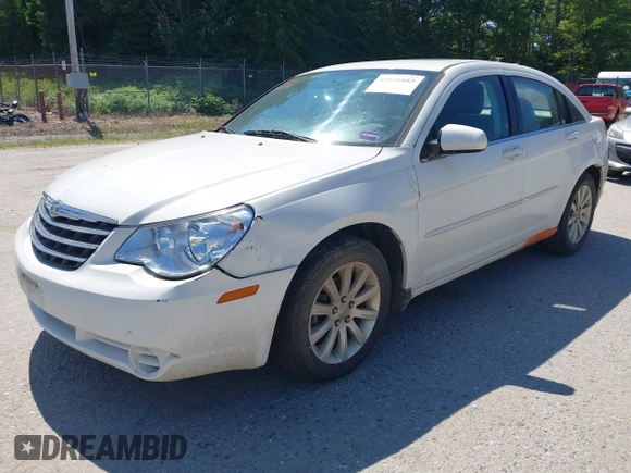 2010 Chrysler Sebring Limited with VIN 1C3CC5FD9AN199621, listed as a IAAI auction lot 42616882 with 110,512 mi miles and . Bid and sale history available at DreamBid. Image 2.