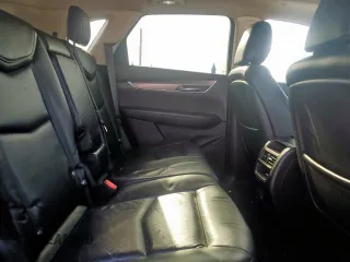 2018 Cadillac XT5 Luxury FWD with VIN 1GYKNCRS2JZ208016, listed as a Copart auction lot 61551285 with 145,019 mi miles and Salvage title. Bid and sale history available at DreamBid. Image 11.