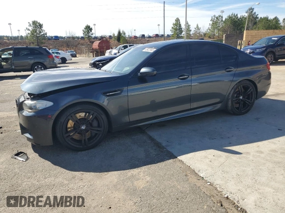 2013 BMW M5 with VIN WBSFV9C50DC773250, listed as a Copart auction lot 45922965 with 96,246 mi miles and Salvage Title. Bid and sale history available at carsss.com. Image 1.