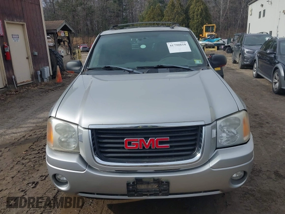 2004 GMC Envoy SLE with VIN 1GKDS13S442350938, listed as a IAAI auction lot 41790810 with 161,998 mi miles. Bid and sale history available at carsss.com. Image 6.