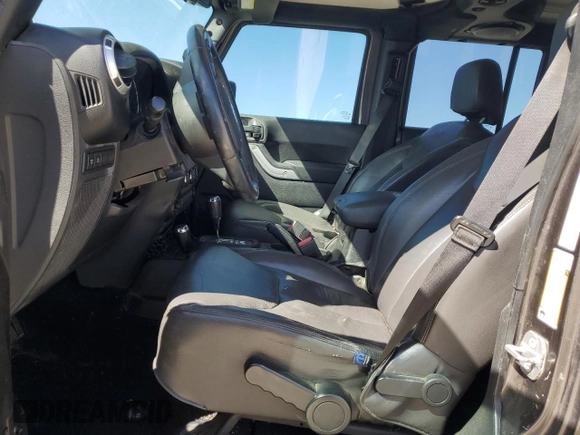 2014 Jeep Wrangler Unlimited Rubicon with VIN 1C4BJWFG0EL199649, listed as a Copart auction lot 47801775 with 141,116 mi miles and Salvage Title. Bid and sale history available at carsss.com. Image 7.