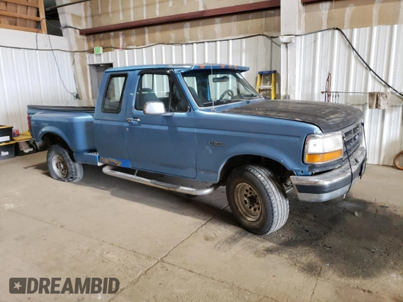 1993 Ford F-150 with VIN 1FTEX14N2PKB50753, listed as a Copart auction lot 61099185 with 144,074 mi miles and Salvage title. Bid and sale history available at DreamBid. Image 4.