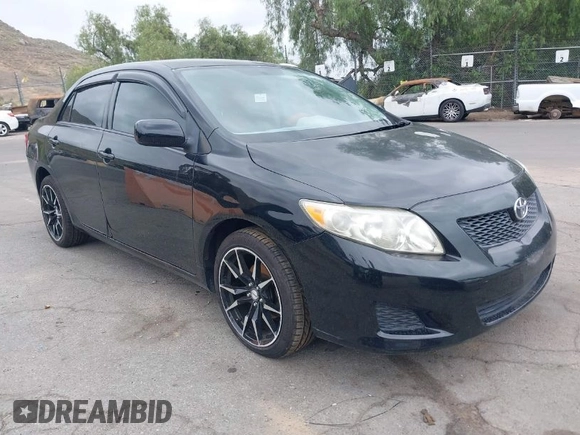 2010 Toyota Corolla with VIN 1NXBU4EE9AZ268818, listed as a IAAI auction lot 42058417 with 115,124 mi miles. Bid and sale history available at carsss.com. Image 1.