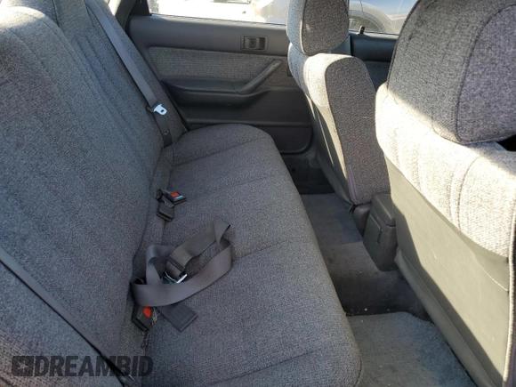 1990 Toyota Camry z VIN JT2SV21E7L3411990, wystawiony jako Copart lot #88557555 z przebiegiem 335 803 mil mil oraz Szkoda całkowita • Salvage title. Historia ofert i sprzedaży dostępna na DreamBid. Obrazek 10.