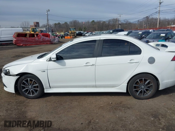 2015 Mitsubishi Lancer SE with VIN JA32V2FW9FU025402, listed as a IAAI auction lot 41646407 with 67,201 mi miles. Bid and sale history available at carsss.com. Image 14.