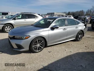 2023 Honda Civic Touring z VIN 2HGFE1F97PH323539, wystawiony jako Copart lot #48790795 z przebiegiem 24 049 mil mil oraz Szkoda całkowita • Salvage title. Historia ofert i sprzedaży dostępna na DreamBid. Obrazek 1.