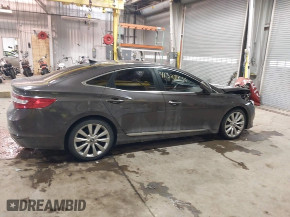 2015 Hyundai Azera Limited z VIN KMHFH4JG2FA432545, wystawiony jako IAAI lot #41329236 z przebiegiem 98 661 mil mil oraz . Historia ofert i sprzedaży dostępna na DreamBid. Obrazek 13.