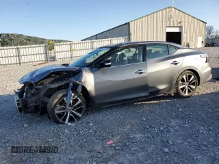 2021 Nissan Maxima SV with VIN 1N4AA6CV1MC511710, listed as a Copart auction lot 51989755 with 74,258 mi miles and Salvage title. Bid and sale history available at DreamBid. Image 1.