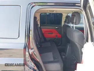 2013 Jeep Patriot Sport with VIN 1C4NJPBA0DD238009, listed as a IAAI auction lot 42301422 with 103,359 mi miles and . Bid and sale history available at DreamBid. Image 8.