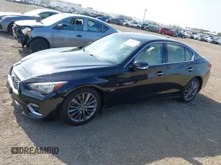 2019 Infiniti Q50 Luxe with VIN JN1EV7AP8KM543395, listed as a IAAI auction lot 42418112 with 43,382 mi miles and . Bid and sale history available at DreamBid. Image 14.