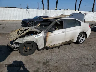 2013 BMW 3 Series 320i with VIN WBA3B1C50DK128766, listed as a Copart auction lot 86587114 with 0 mi miles and Salvage Title. Bid and sale history available at carsss.com. Image 1.