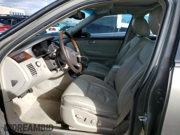 2010 Cadillac DTS 1SD z VIN 1G6KH5EY8AU108702, wystawiony jako Copart lot #76286984 z przebiegiem 177 455 mil mil oraz Szkoda całkowita • Salvage title. Historia ofert i sprzedaży dostępna na DreamBid. Obrazek 7.