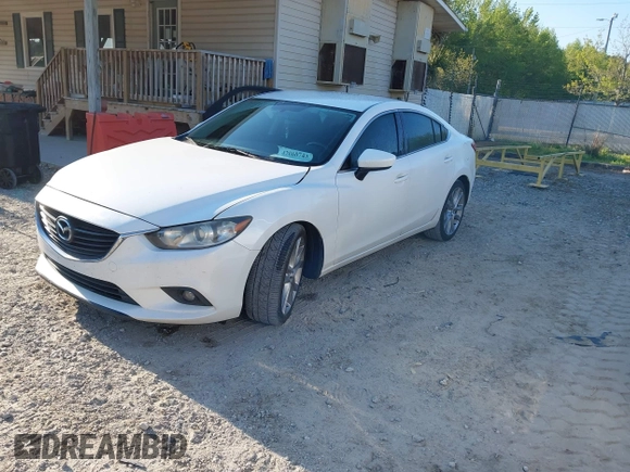 2014 Mazda Mazda6 i Touring with VIN JM1GJ1V65E1117072, listed as a IAAI auction lot 42060743 with 181,524 mi miles. Bid and sale history available at carsss.com. Image 2.