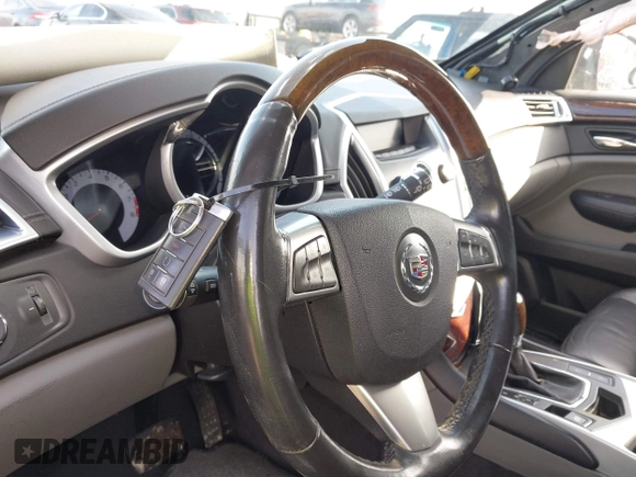 2010 Cadillac SRX Luxury Collection with VIN 3GYFNAEY9AS621998, listed as a IAAI auction lot 41686278 with 84,408 mi miles. Bid and sale history available at carsss.com. Image 11.