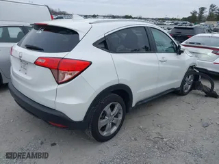 2016 Honda HR-V EX-L w/Navi with VIN 3CZRU5H78GM731268, listed as a IAAI auction lot 41354018 with 58,399 mi miles. Bid and sale history available at carsss.com. Image 4.