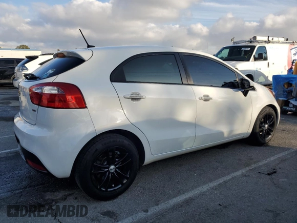 2015 Kia Rio LX with VIN KNADM5A39F6460207, listed as a Copart auction lot 44464245 with 106,792 mi miles and Salvage Title. Bid and sale history available at carsss.com. Image 3.