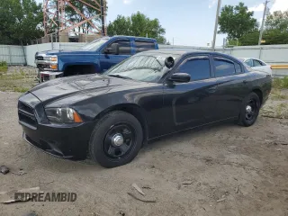 2012 Dodge Charger Police with VIN 2C3CDXAT7CH288137, listed as a Copart auction lot 63271415 with 272,393 mi miles and Clean title. Bid and sale history available at DreamBid. Image 1.